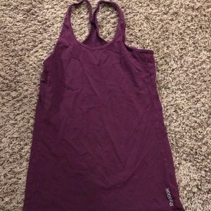 2 Reebok Muscle Tanks